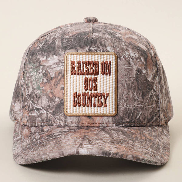 RAISED ON 90'S Camo Trucker Hat